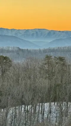 A winter sunrise over the Smoky Mountains shared by East TN Views