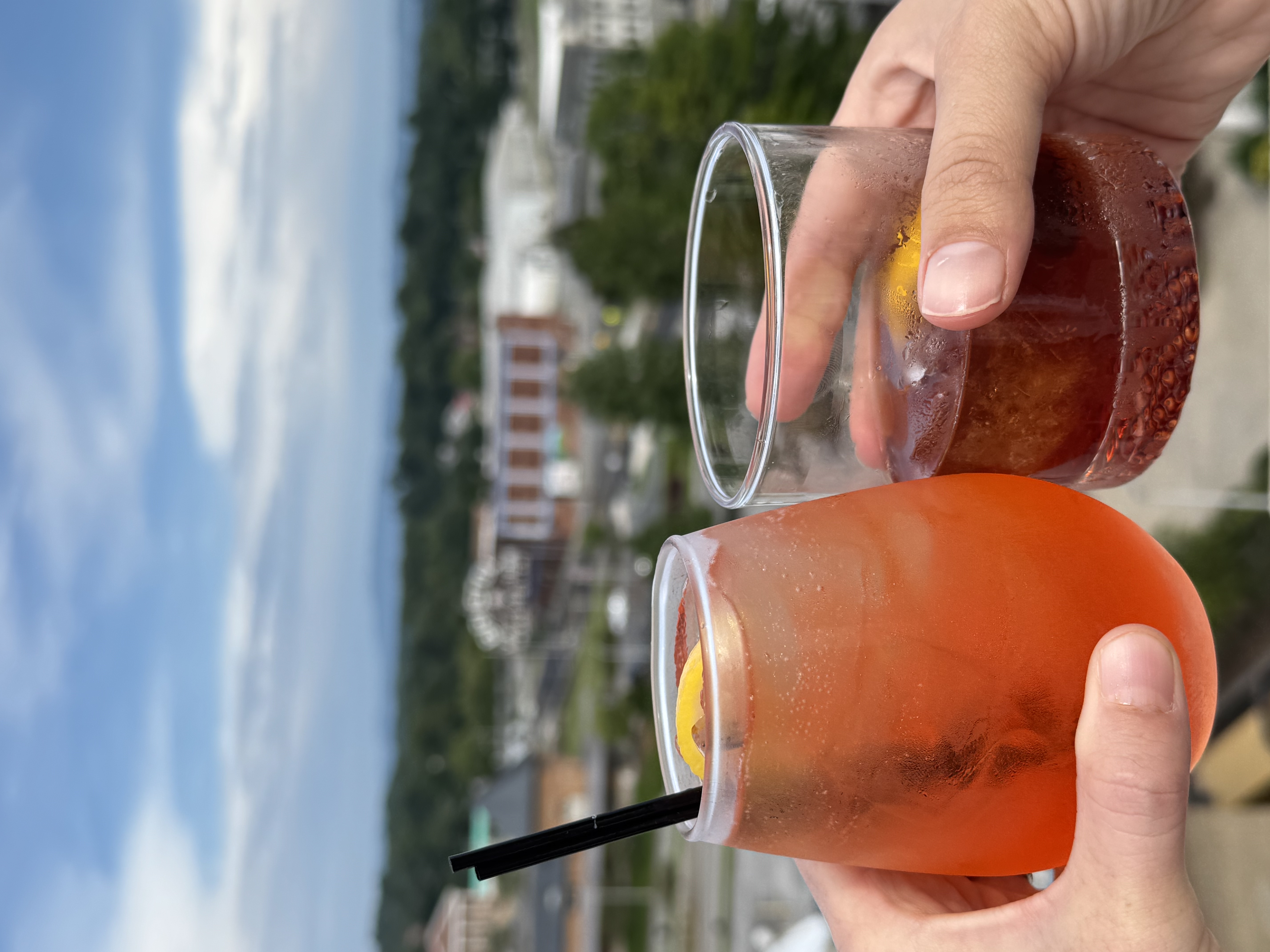 Drinks on rooftop bar, bristol sign, mountain view